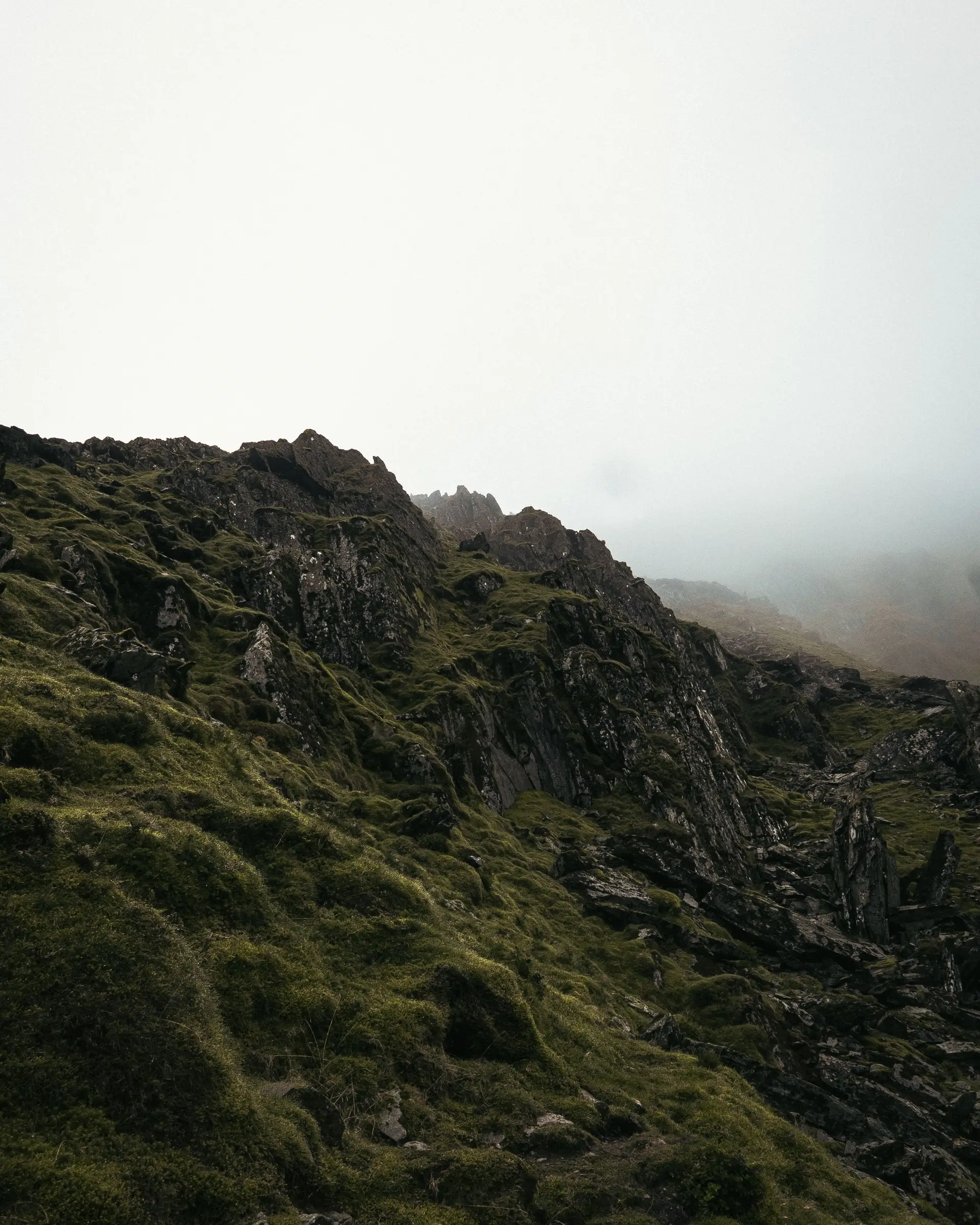 Serene view of misty mountains in Lake District