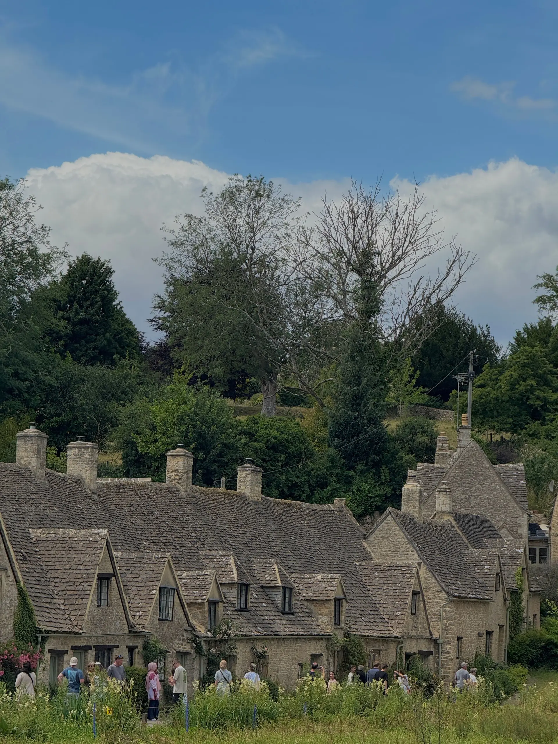 Honey-coloured stone cottages in Bibury, Gloucestershire
