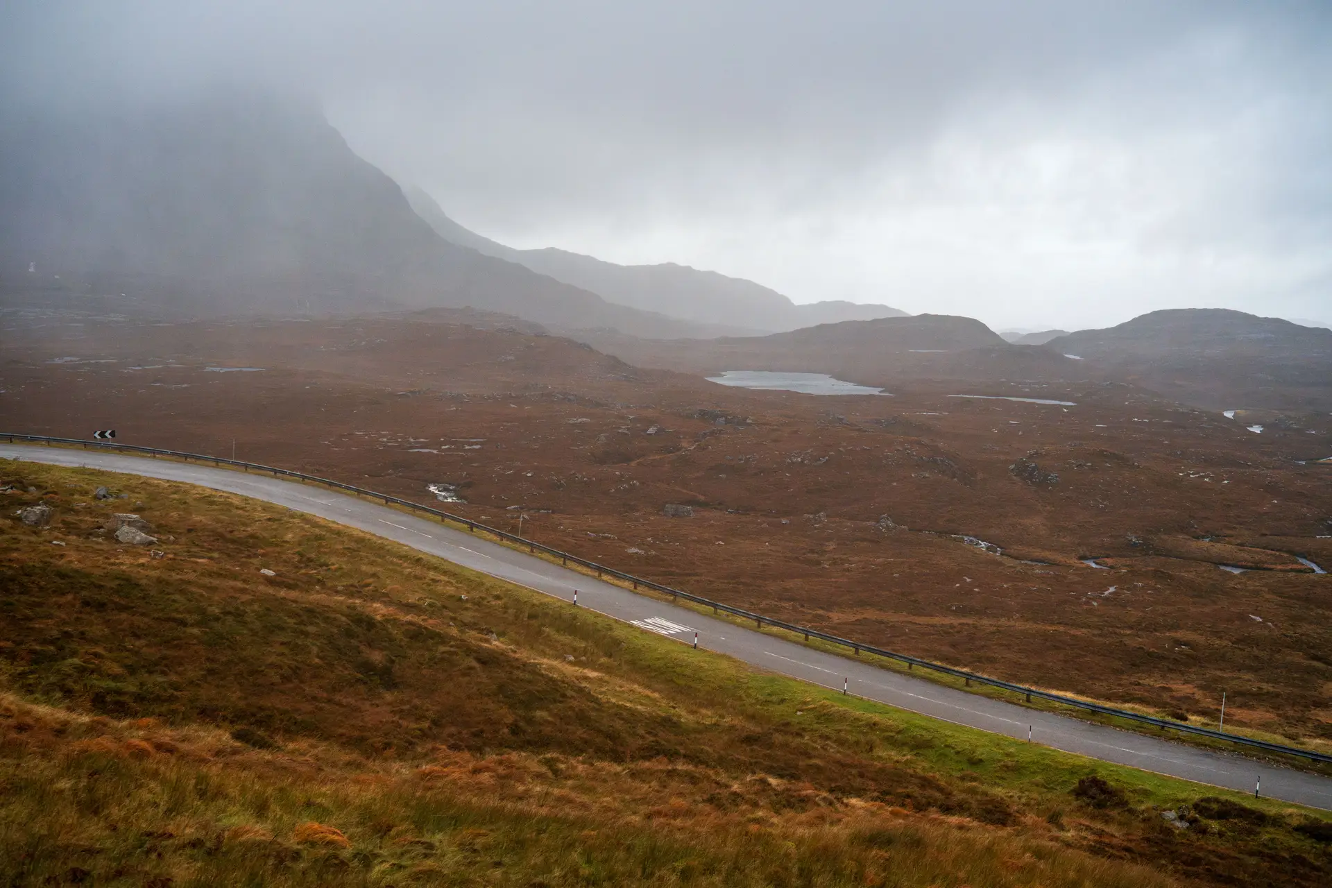 Scenic roadway winding through the dramatic Pass of Glencoe