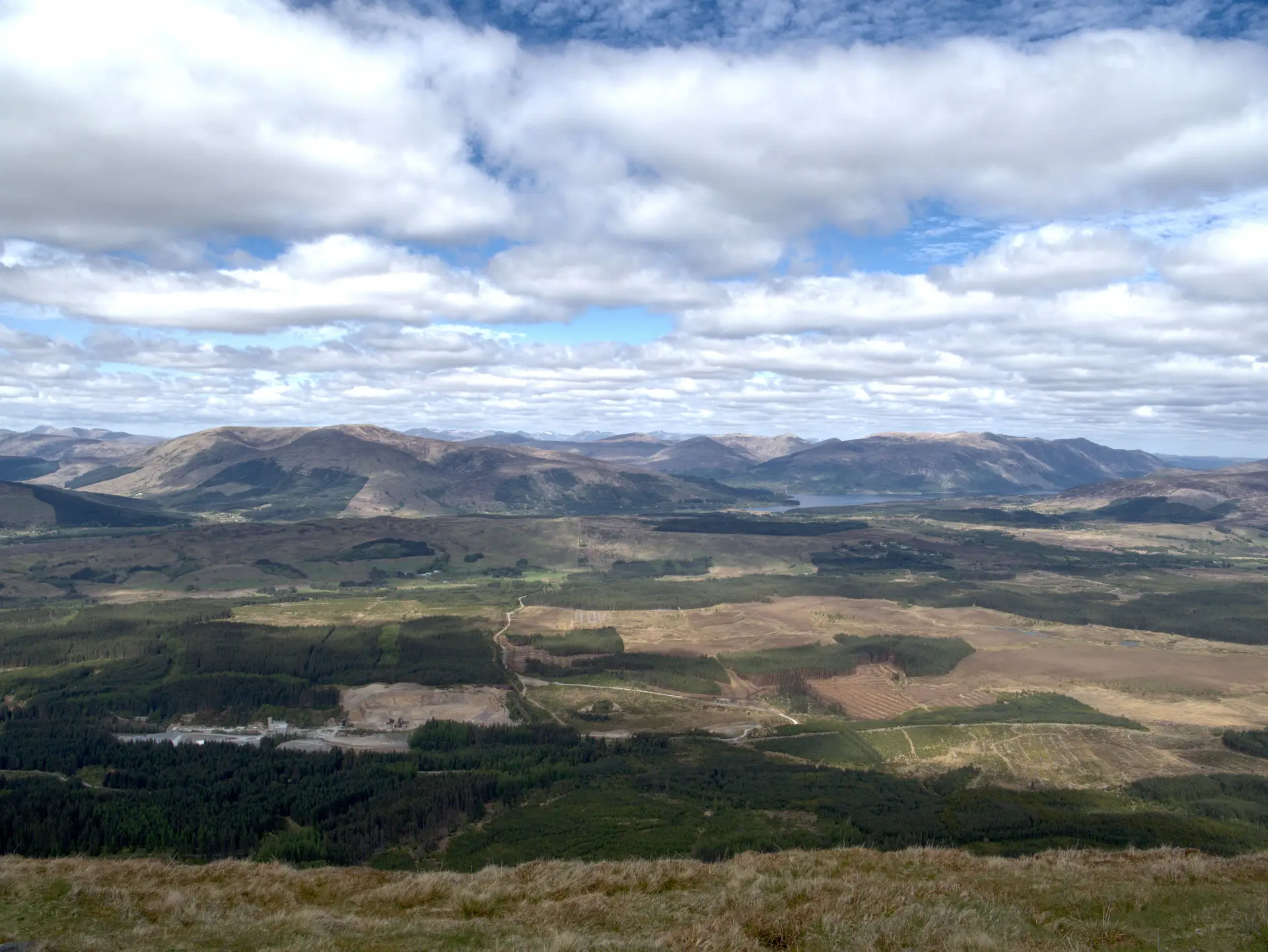 Scottish Highlands expansive rolling hills bathed in gentle morning light