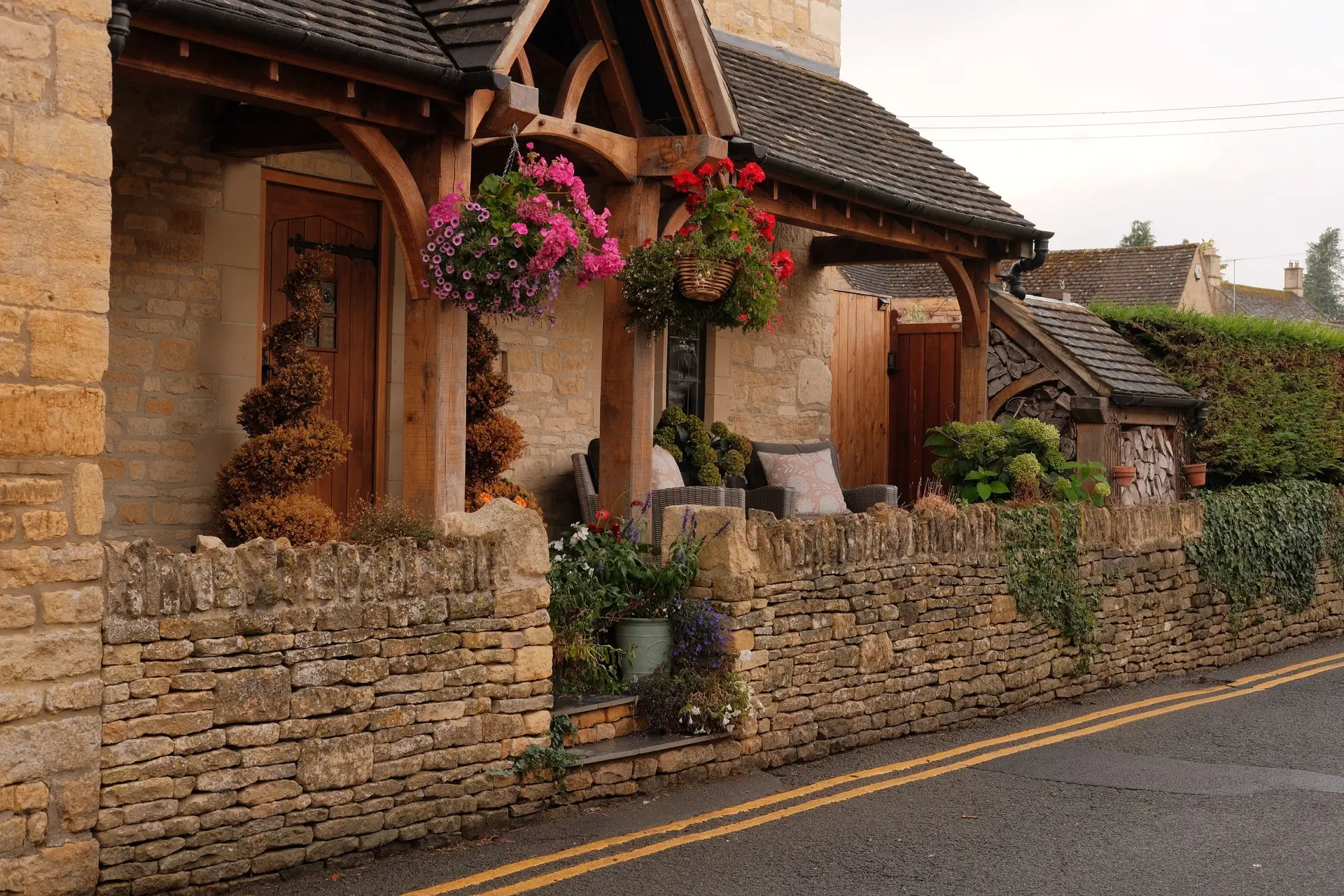 Charming rustic cottage with flower boxes and stone pathways