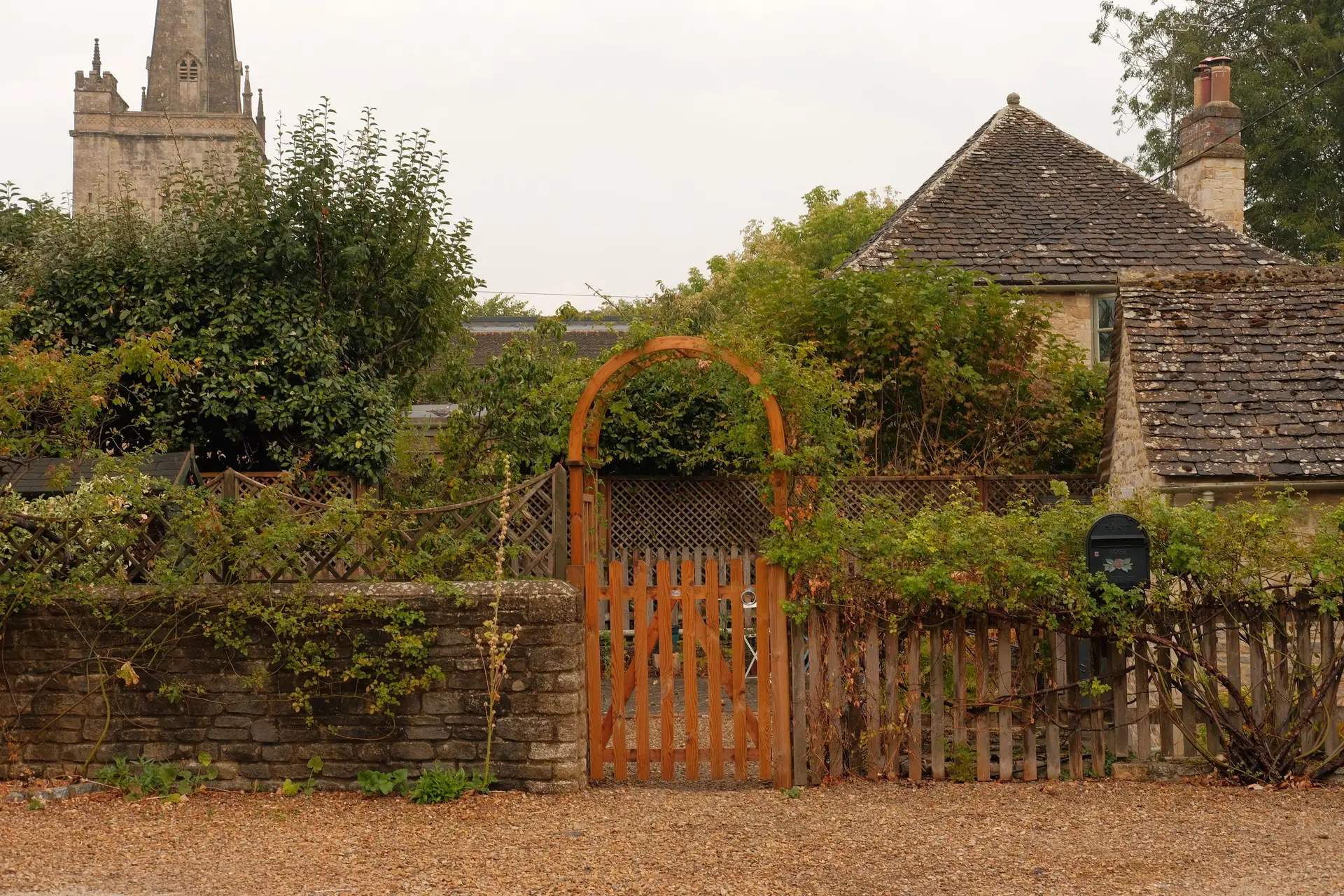 Quiet countryside gate leading into heritage estate garden